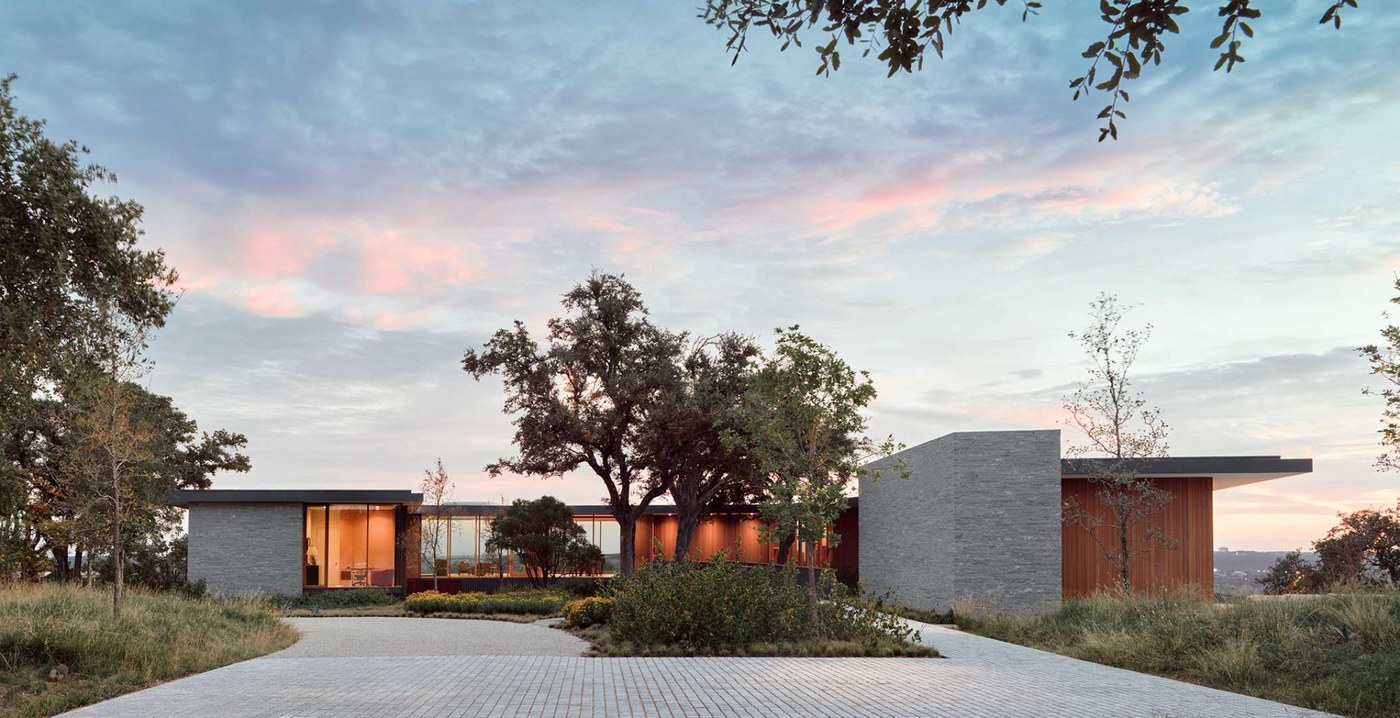 Modern custom home at dusk